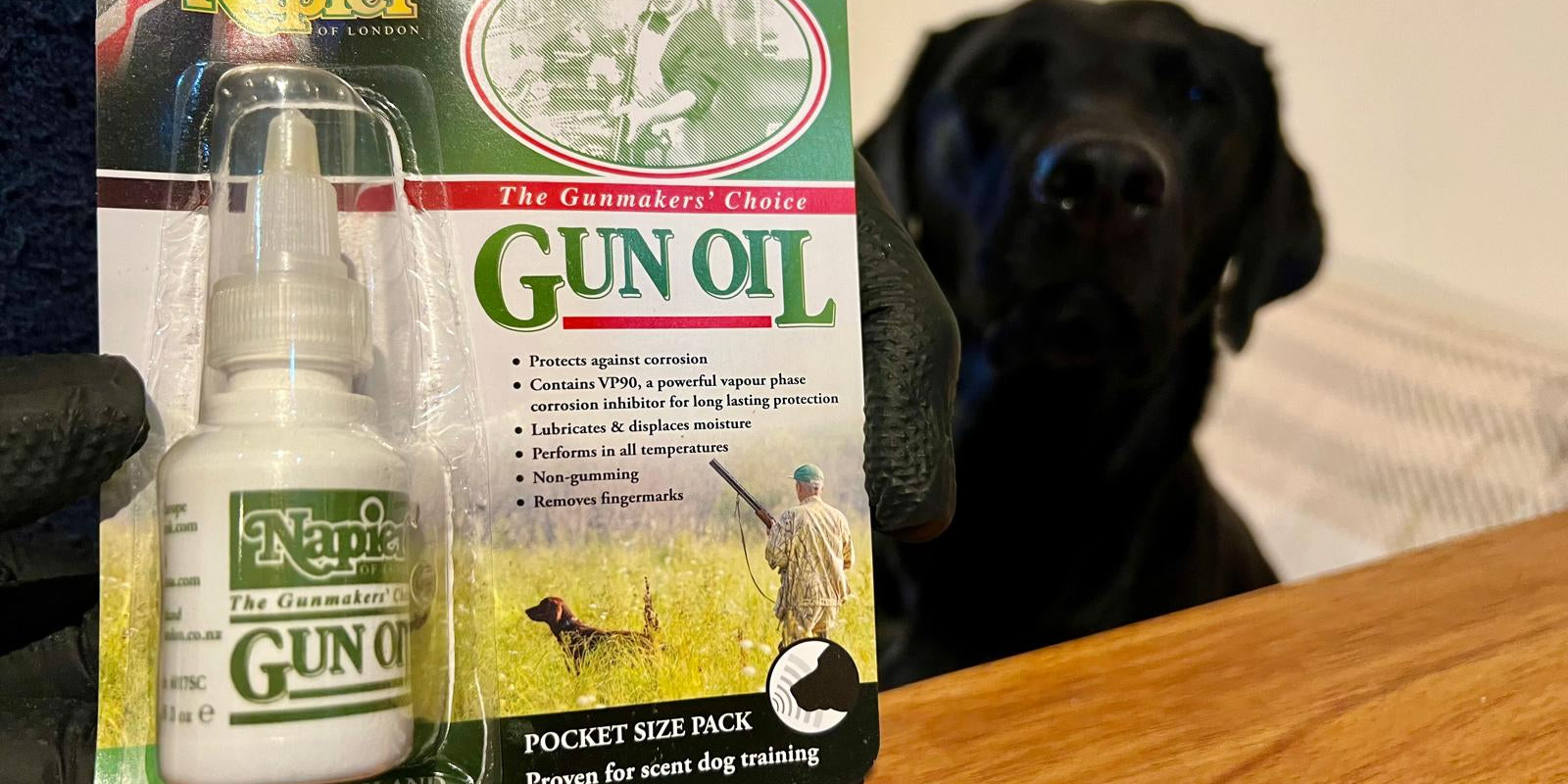 Gun oil and a black labrador